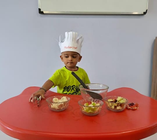 Happy toddlers playing in nursery